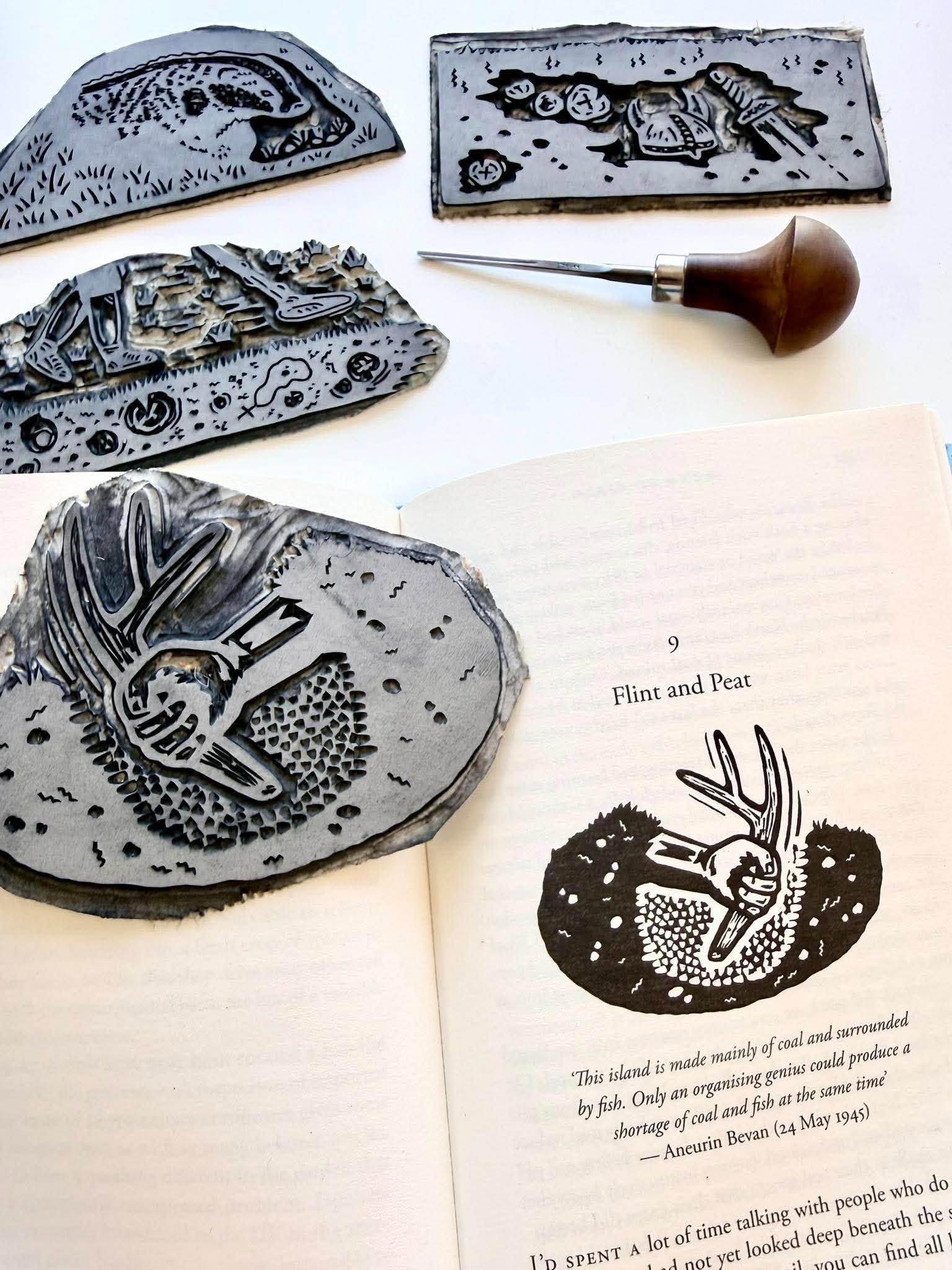 Four linocuts, a printed page incorporating one of the images and a cutting tool. Picture by Haychley Webb.