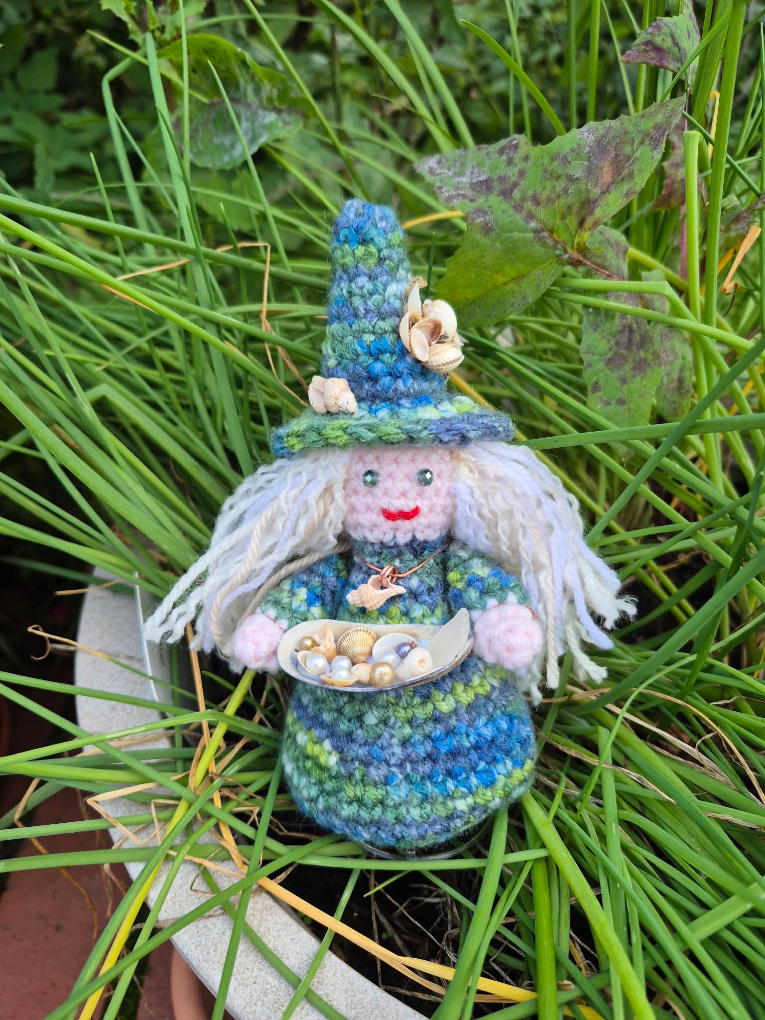 A witch in wool on a plant pot. Picture by Tina Hampton.