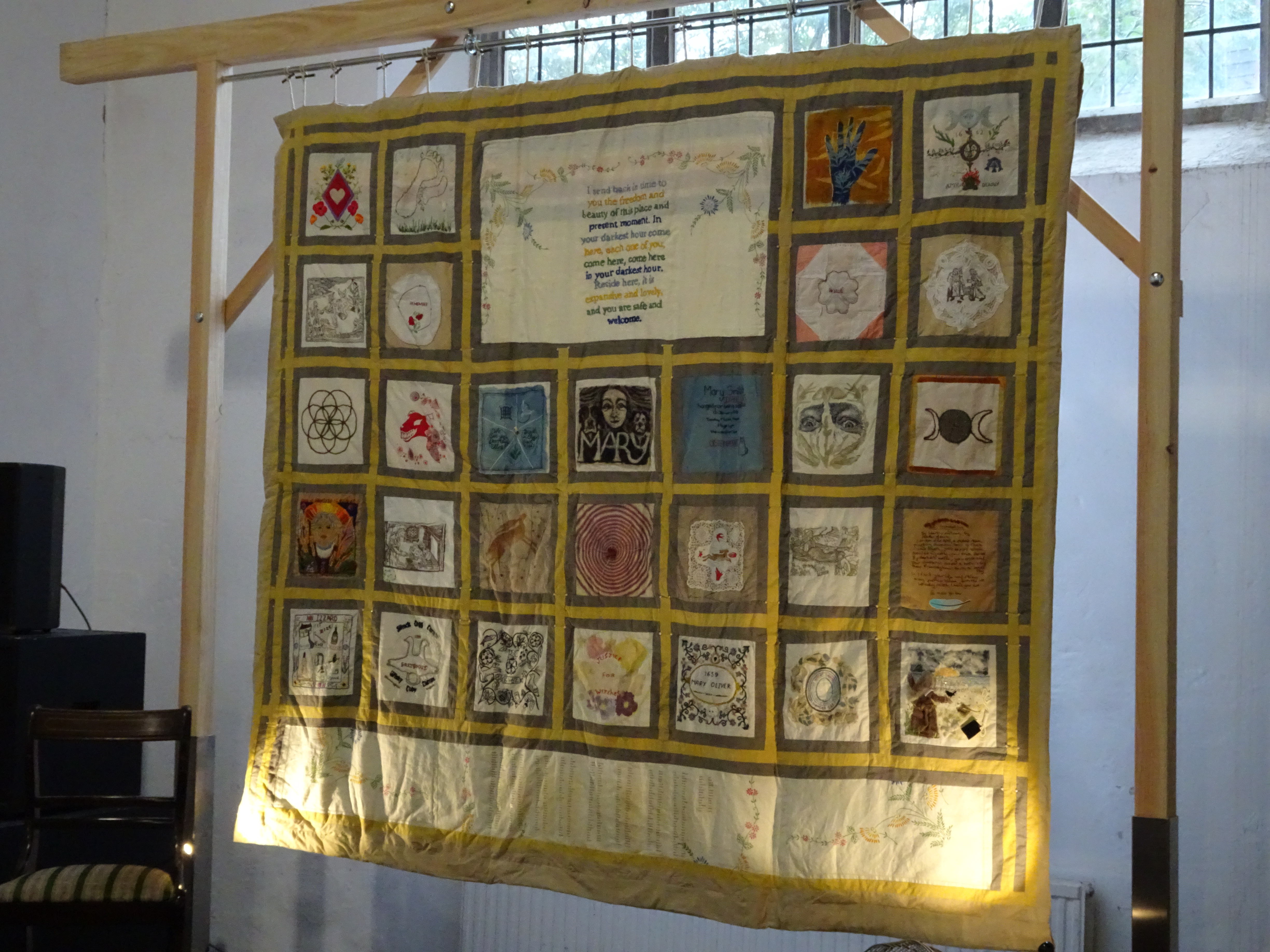 The We Are Witch quilt displayed.
